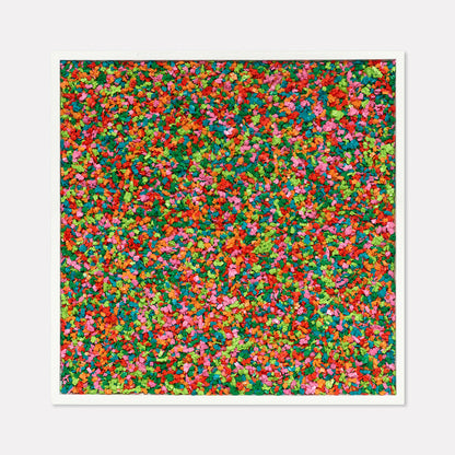 The artwork 'Mini Yellow Packet' by Lori Kirkbride features a vibrant abstract composition with speckled dots in a kaleidoscope of colors including bright red, green, yellow, pink, and blue. The painting creates a confetti-like texture across a square panel, achieved through acrylic polymer and resin application, measuring 19 x 19 inches.