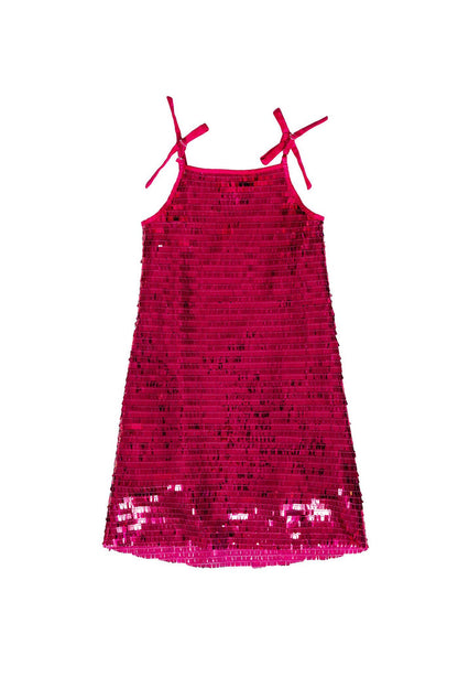 The Mini Zelda Dress in Fuchsia Shingle Sequin by Ivy City Co is a bright pink, sequined kids party dress featuring spaghetti straps and small bows on each shoulder, shown laid flat on a white background—ideal for any special occasion.