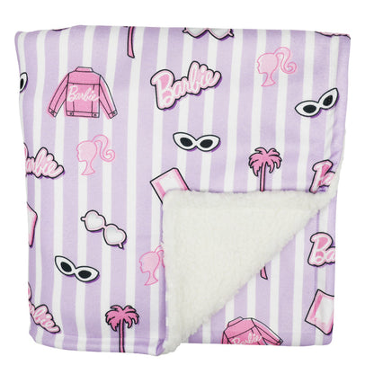 The Sassy Woof Pet Blanket - BARBIE™ Closet Goals features lavender and white stripes, Barbie-themed designs (sunglasses, palm trees, jackets, logos), and a plush white sherpa lining from the Barbie x Sassy Woof collection.