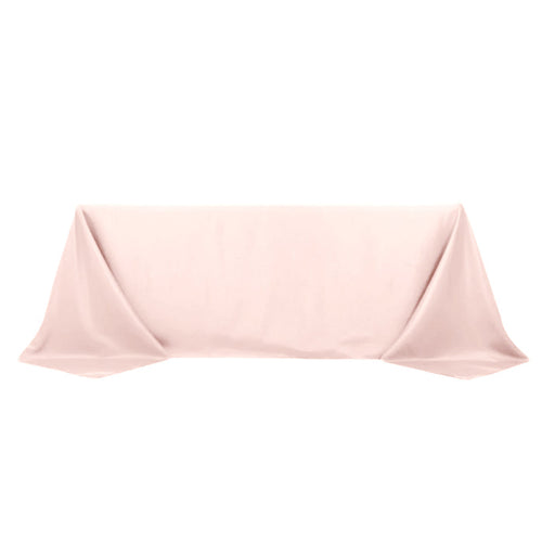 Pink tablecloth draped elegantly on a table