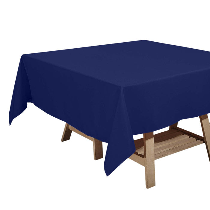 Navy blue tablecloth draped over a wooden table