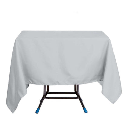 Gray tablecloth draped over a folding table.