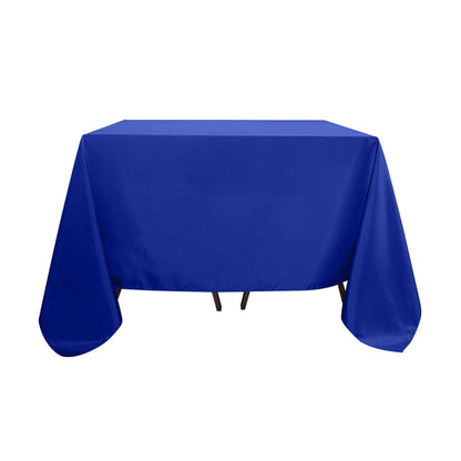 Blue tablecloth draped over a table, showcasing its vibrant color and smooth texture.