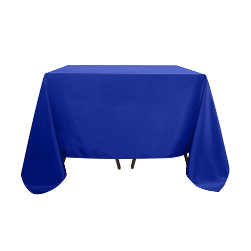 Blue tablecloth draped over a table, showcasing its vibrant color and smooth texture.