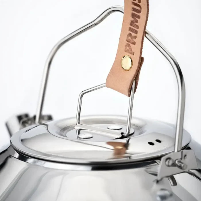 Close-up lid detail on a Primus Campfire Stainless Steel Kettle 900ml on a white background