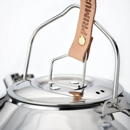 Close-up lid detail on a Primus Campfire Stainless Steel Kettle 900ml on a white background