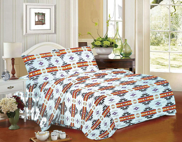 Queen 4pc Sheet Set – White displayed in a stylish bedroom with Navajo print, featuring a fitted sheet, flat sheet, and pillow cases.