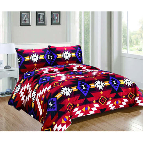 Sherpa Comforter (King/Queen Set) featuring vibrant colors and a stylish pattern in a cozy bedroom setting.