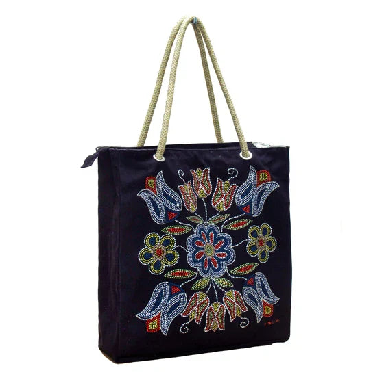 Black tote bag with colorful floral embroidery and rope handles on a white background