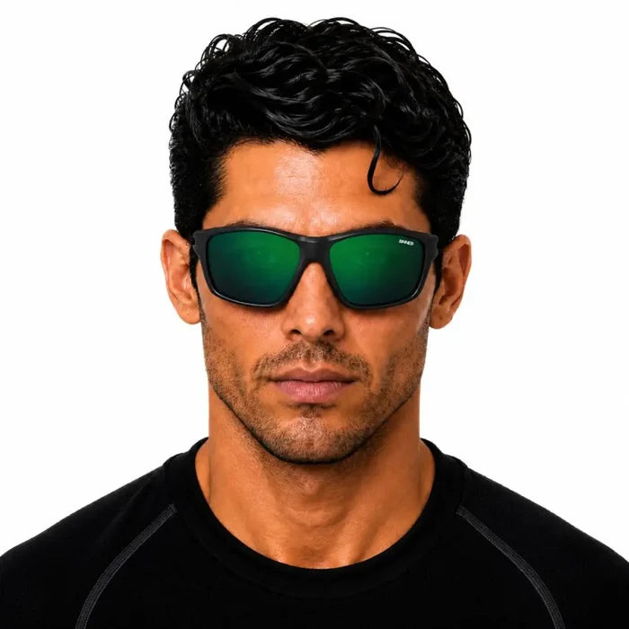 Man wearing a pair of Sinner Eyak polarised sunglasses in Cry Black on a white background