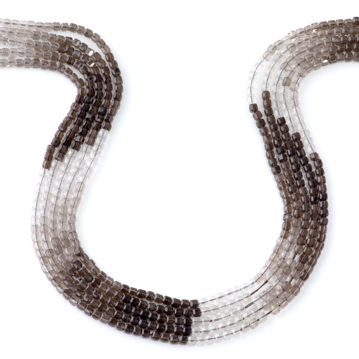 This is a Dakota Stones 3mm Smoky Quartz Banded Gemstone strand with A grade table-cut cube beads in 15-16 inch strand.