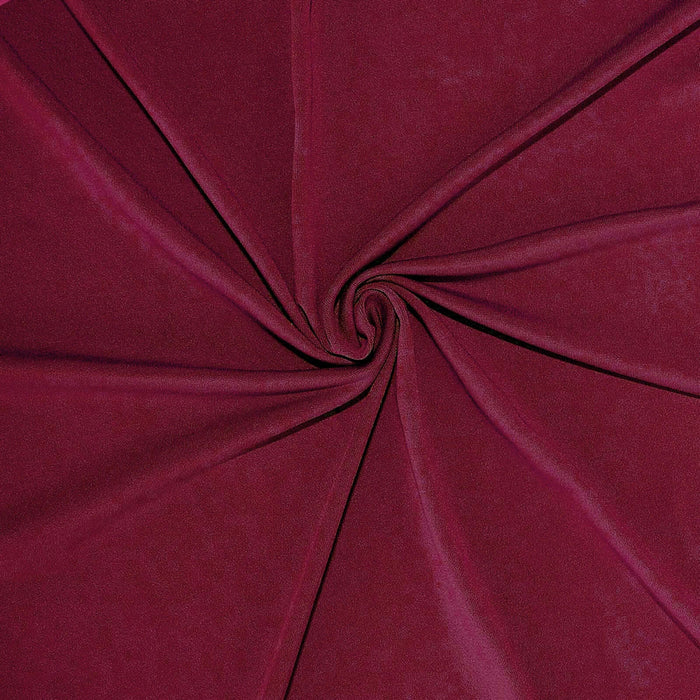 Burgundy fabric texture in a spiral pattern. #whtbkgd