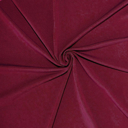 Burgundy fabric texture in a spiral pattern. #whtbkgd