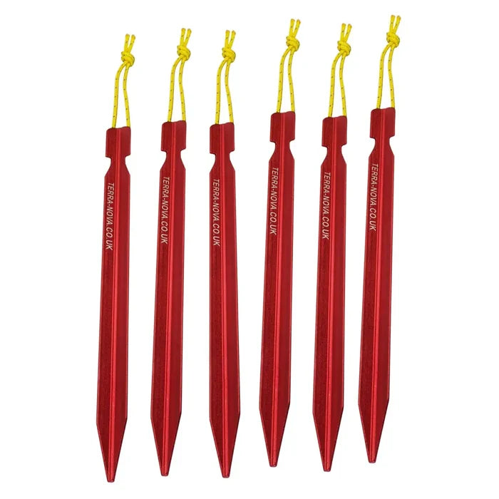 Terra Nova Terra Firma aluminium alloy Y profile lightweight tent pegs in red laid flat showing the contents of a pack of six