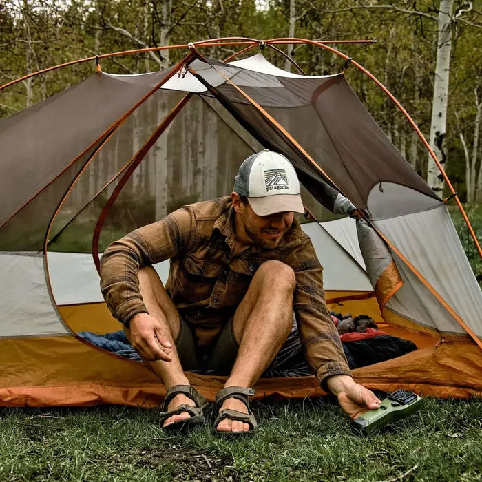 Thermacell MR300 portable mosquito repeller in use outdoors with a wild camper