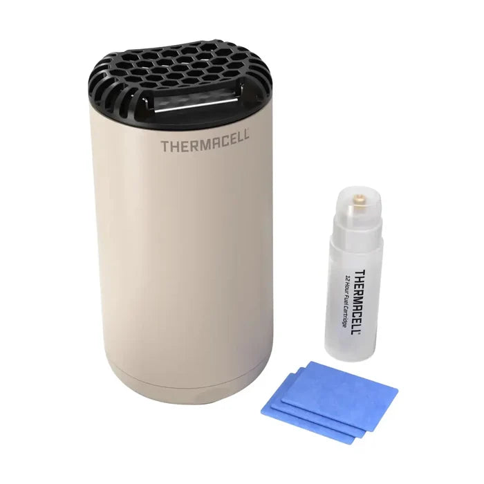 Thermacell Patio Shield mosquito repeller in cream colour showing the fuel cartridge and the three repellent mats