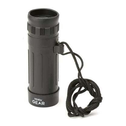 Whitby Gear Pocket Monocular 8x21 shown upright with its lanyard attachment on a white background