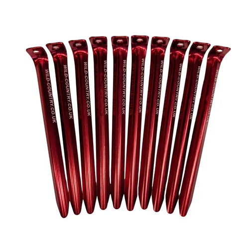 Wild Country aluminium alloy v angle tent pegs in red laid out in ten units as per pack