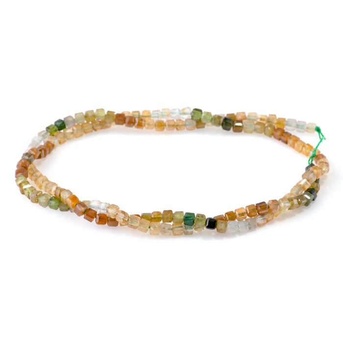 This is a Dakota Stones 3mm Yellow Green Tourmaline Banded Gemstone strand with A grade table-cut cube beads in 15-16 inch strand.