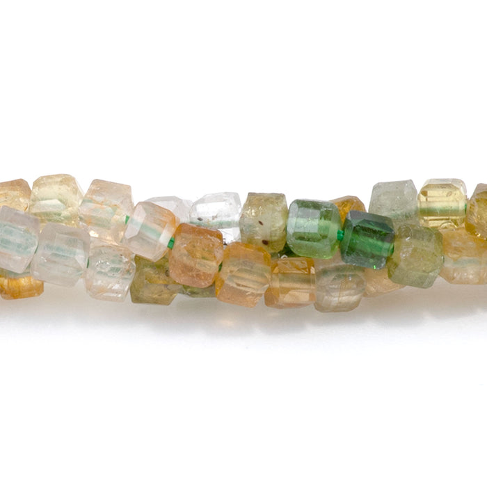 This is a Dakota Stones 3mm Yellow Green Tourmaline Banded Gemstone strand with A grade table-cut cube beads in 15-16 inch strand.