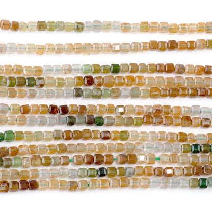 This is a Dakota Stones 3mm Yellow Green Tourmaline Banded Gemstone strand with A grade table-cut cube beads in 15-16 inch strand.